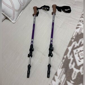 REI Traverse Trekking Purple/ Silver . Totally adjustable. Best for hiking 🥾